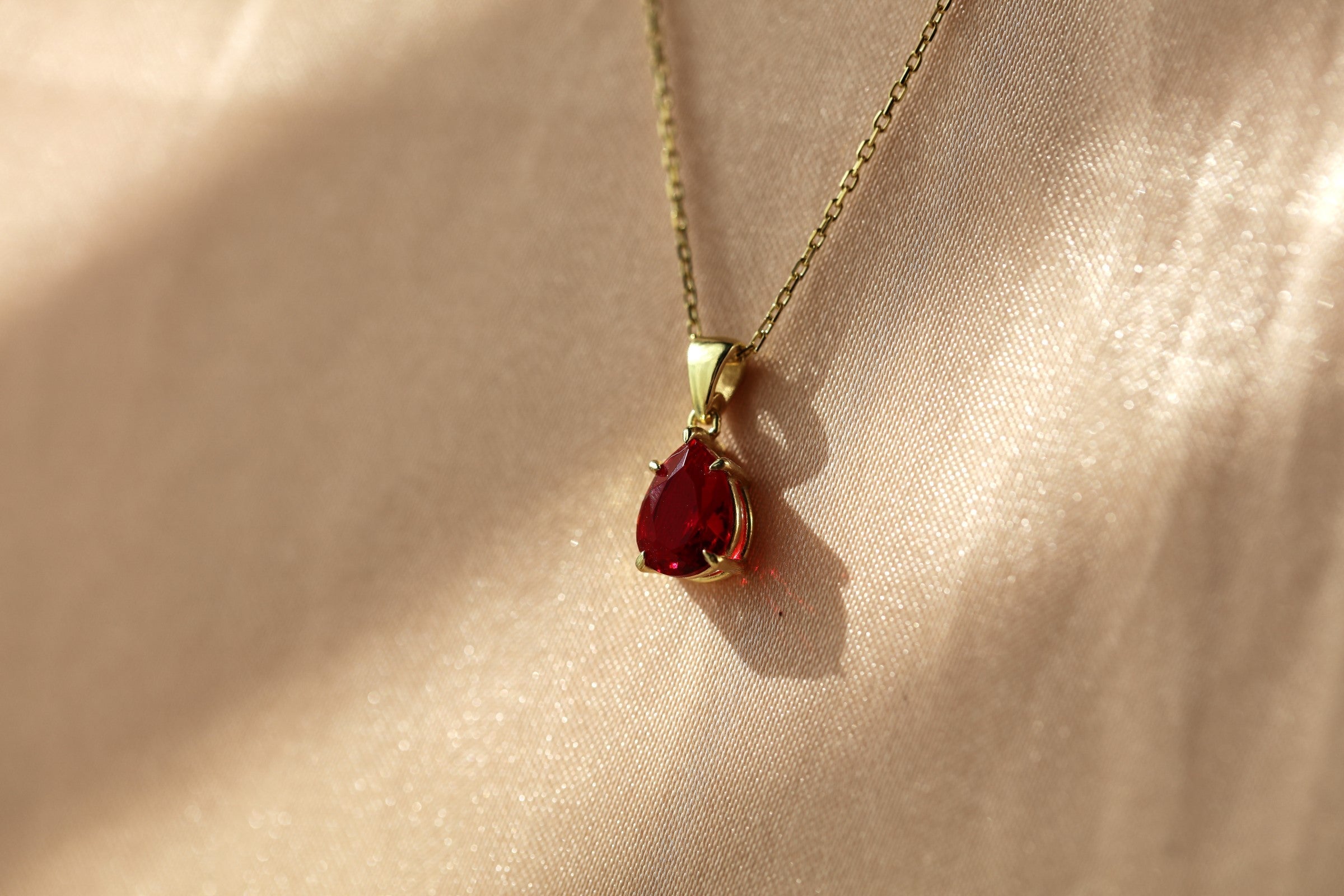 Pear-Shaped Claw Prong Ruby Necklace - July Birthstone Jewelry